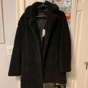 mid length black fluffy jacket